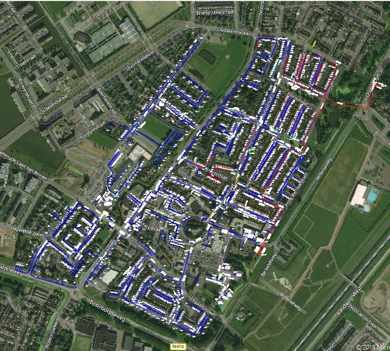 AutoCAD Map 3D FTTH network design with satellite imagery, network labels, symbols and engineering details for a Dutch village.