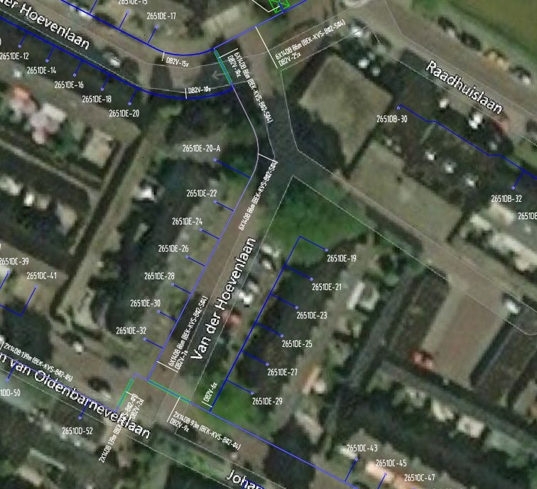 Detailed AutoCAD Map 3D view of an FTTH network design with satellite image background, network labels and symbols.
